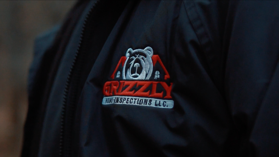 About us page image, of a Grizzly Home Inspections branded jacket